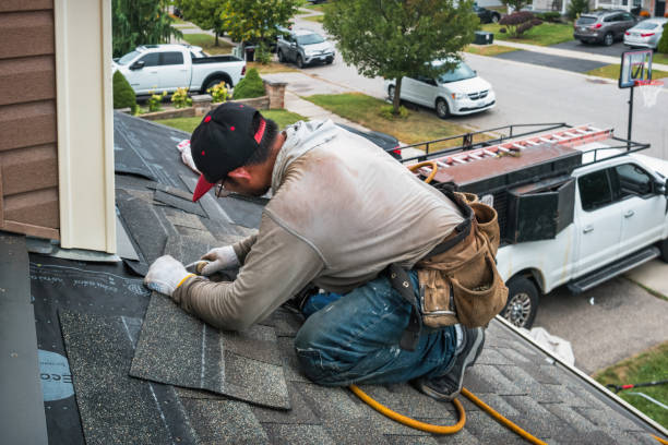 Professional Gutter Installation technician working in Ocean Grove, MA